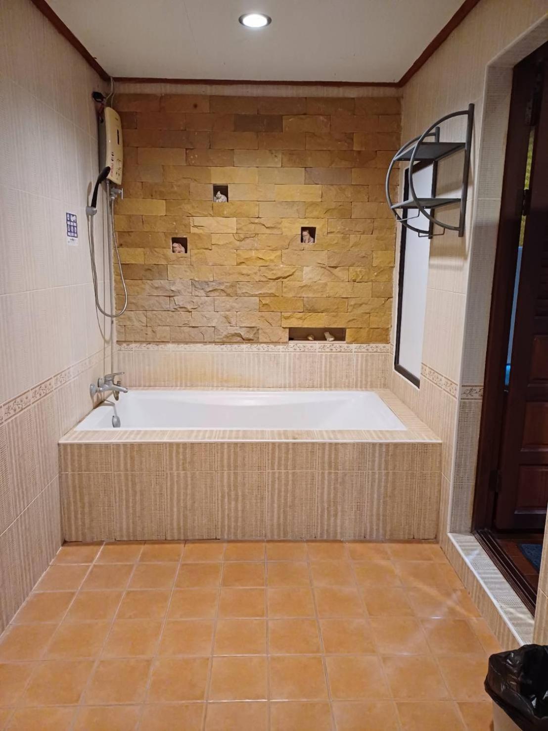 Orchid Home Тау Экстерьер фото