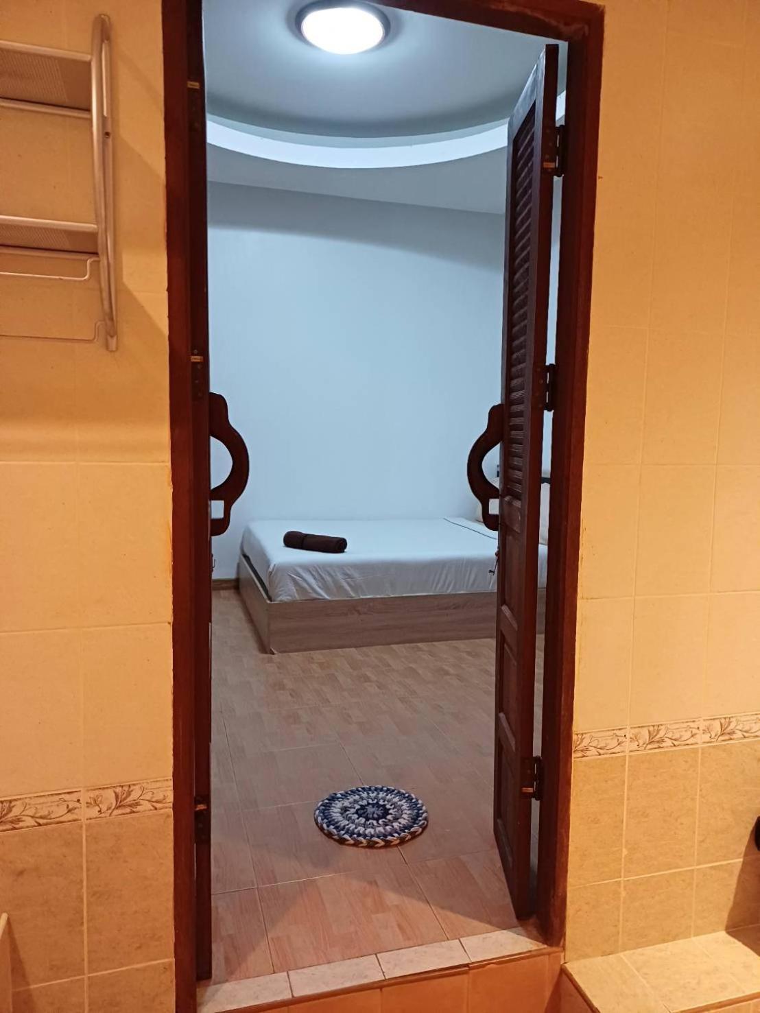 Orchid Home Тау Экстерьер фото