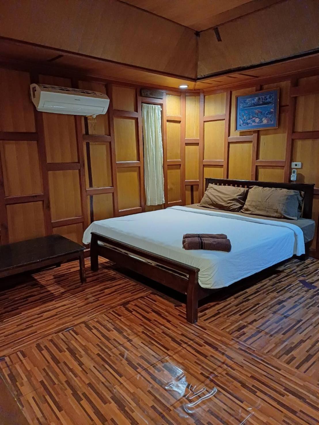 Orchid Home Тау Экстерьер фото