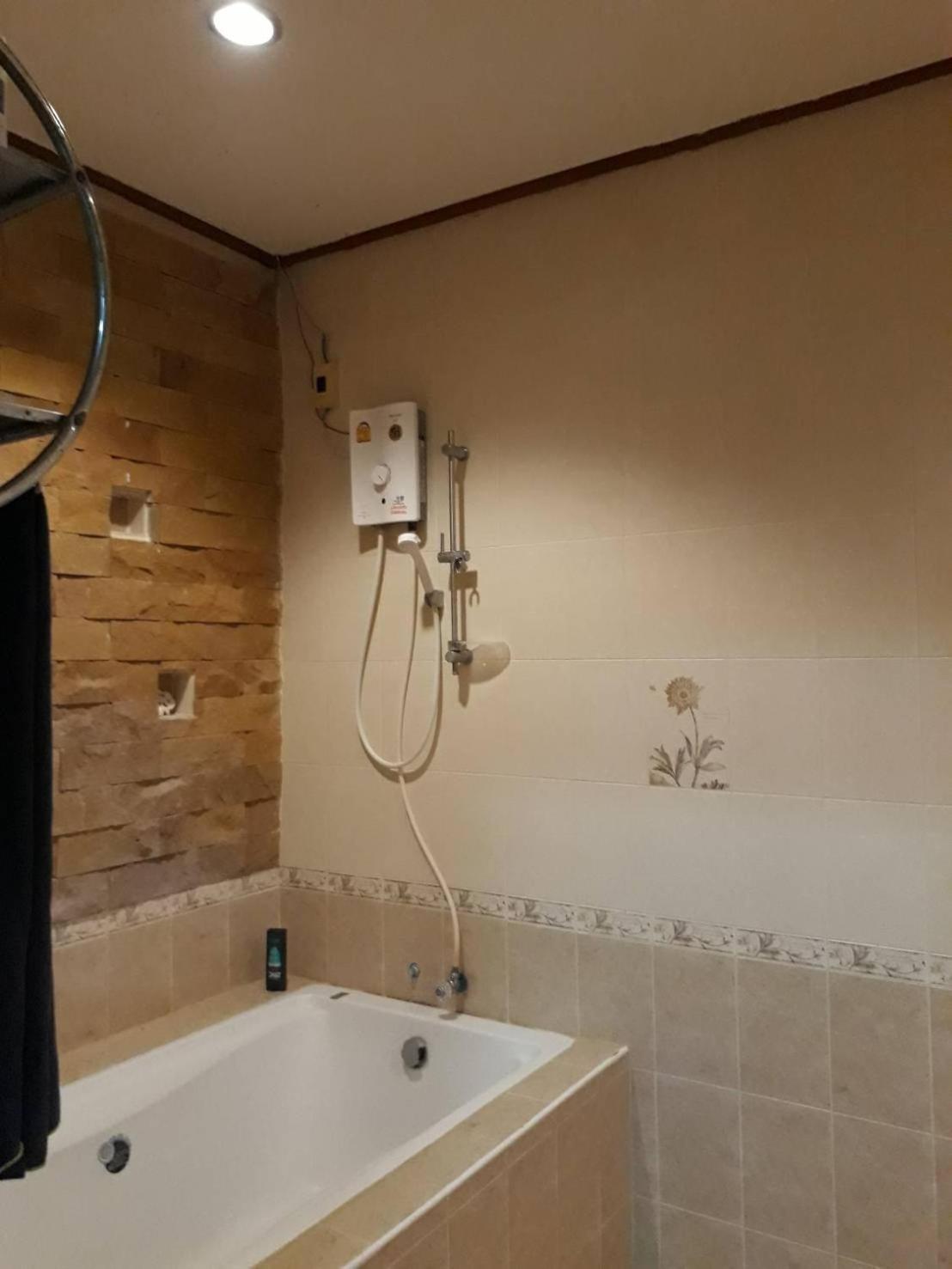 Orchid Home Тау Экстерьер фото